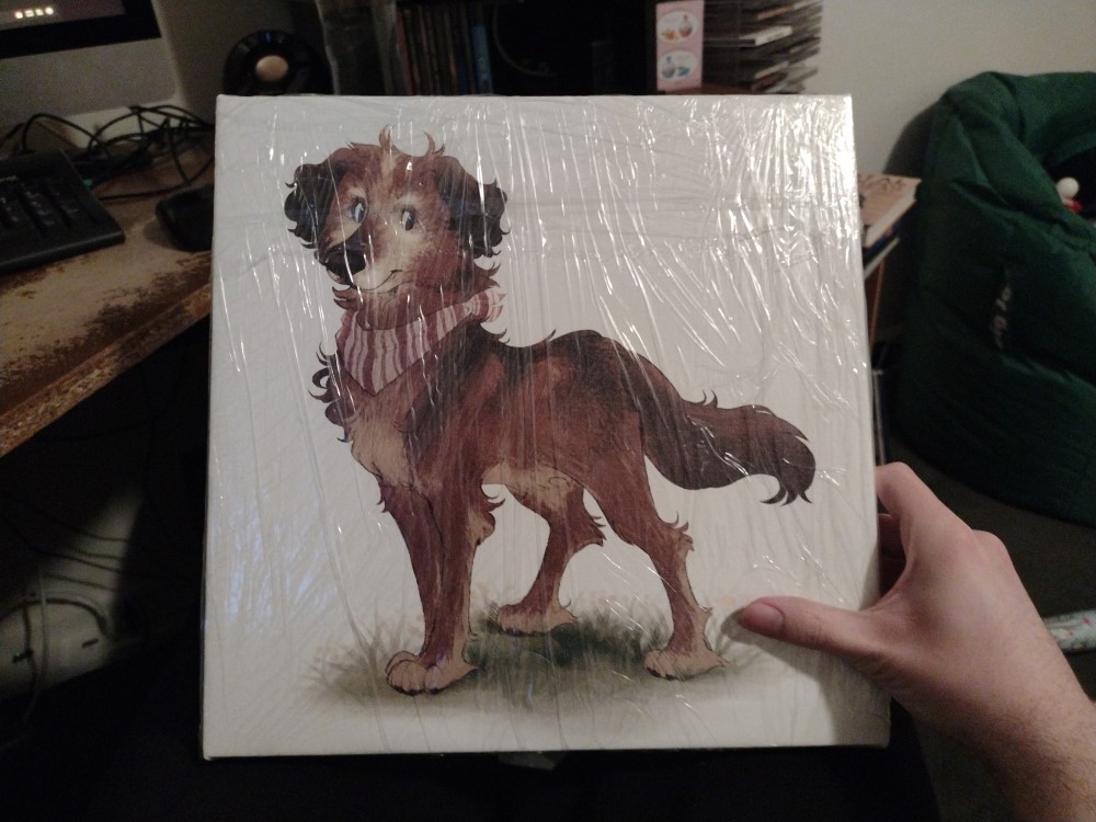 A drawing of our dog Ralphie printed on canvas